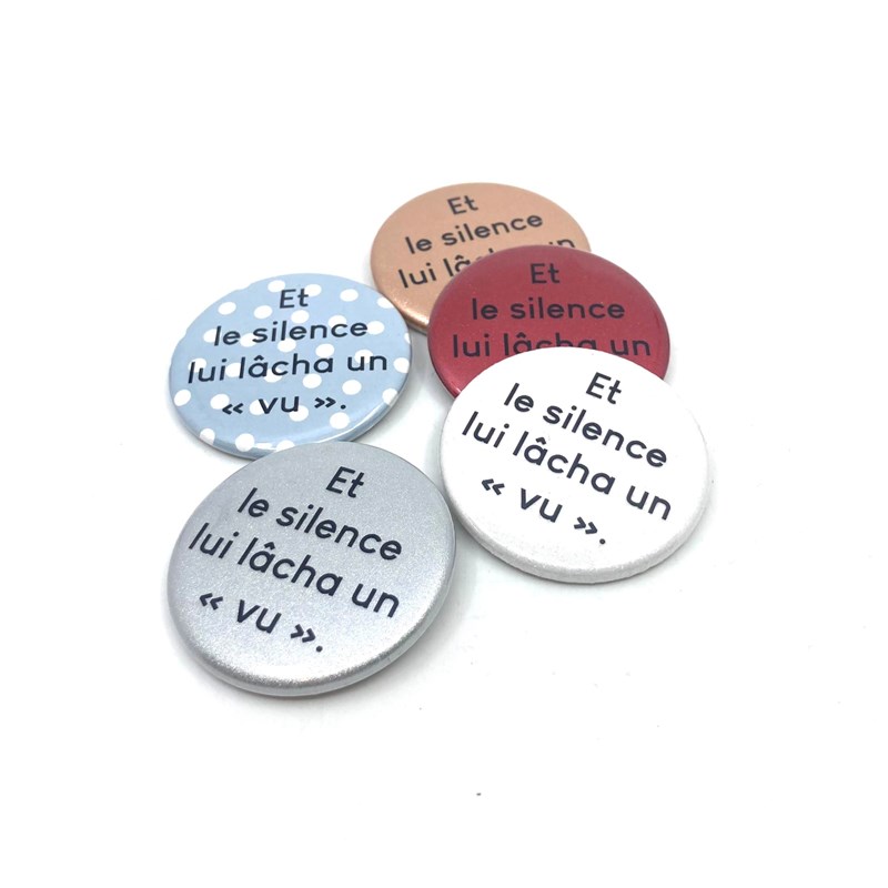 Badge "E t le silence lui lâcha un "vu""